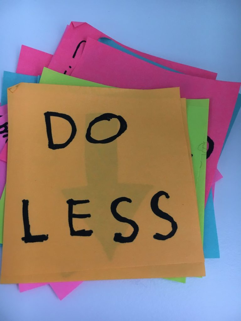 A stack of post-its saying Do Less